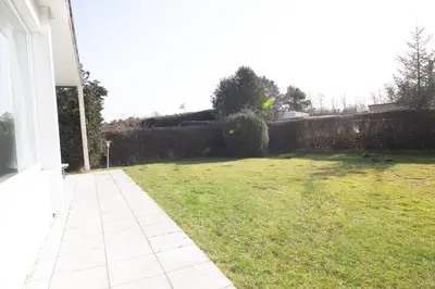 Ein Garten an der Unterkunft Ferienhaus Kleeblatt 5 - Zentrale, ruhige Lage mit Garten und Terrasse
