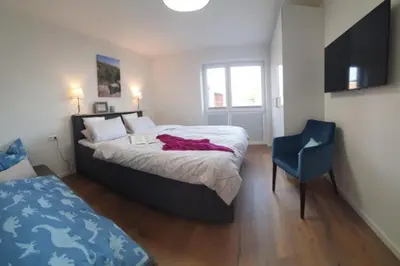 Ein Bett oder Betten in einem Zimmer der Unterkunft Neue Liebe Haffkrug 1