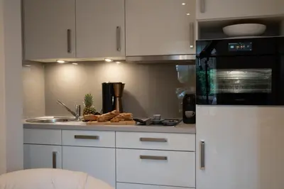 Küche/Küchenzeile in der Unterkunft Studio-Apartment Piccolino 26, Timmendorfer Strand- Strandkorb inklusive & privaten Zugang zur Ostsee