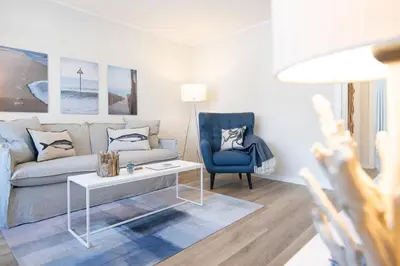 Ein Sitzbereich in der Unterkunft Hansa 3 Bargstädts Apartment Ostseestrand