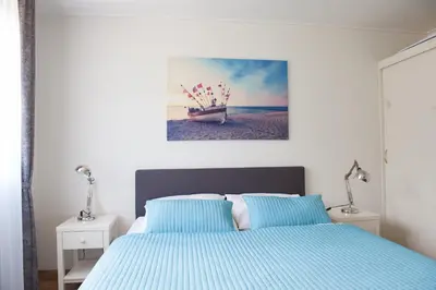 Ein Bett oder Betten in einem Zimmer der Unterkunft Gronenberger Mühle Haus 02