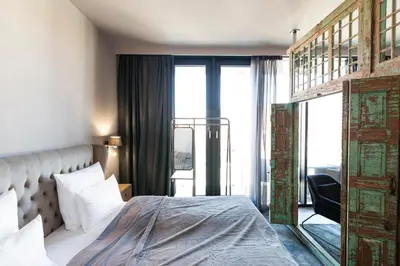 Ein Bett oder Betten in einem Zimmer der Unterkunft Port of Travemünde, Opening 2021