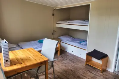 Ein Bett oder Betten in einem Zimmer der Unterkunft Finnenhaus 9