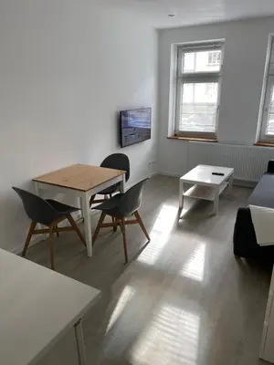 Ein Sitzbereich in der Unterkunft Zentrale und schöne Ferienwohnung