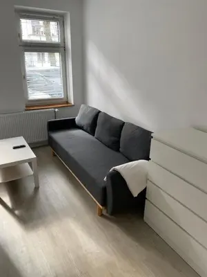 Ein Sitzbereich in der Unterkunft Zentrale und schöne Ferienwohnung