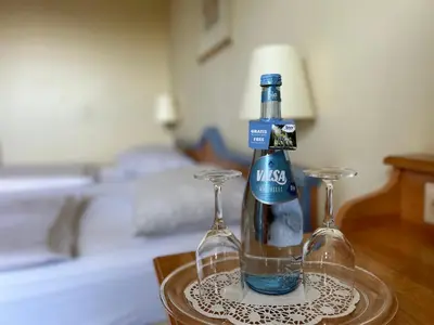 Ein Bett oder Betten in einem Zimmer der Unterkunft Country Hotel Timmendorfer Strand