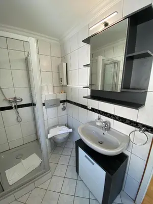Ein Badezimmer in der Unterkunft Casa Raphael direkt am Scharbeutzer Strand