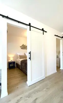 Ein Bett oder Betten in einem Zimmer der Unterkunft Residenz Am Hang
