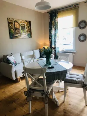 Ein Sitzbereich in der Unterkunft Ferienwohnung B im Ferienhaus Antika