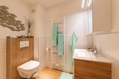 Ein Badezimmer in der Unterkunft Ferienwohnung Kleine Strandkoje