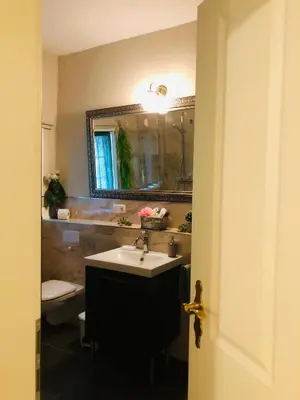 Ein Badezimmer in der Unterkunft Ferienwohnung A im Ferienhaus Antika