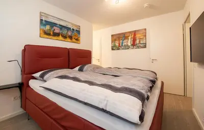 Ein Bett oder Betten in einem Zimmer der Unterkunft Ferienwohnung Urlaubsanker