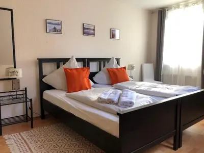Ein Bett oder Betten in einem Zimmer der Unterkunft Ferienwohnung Seeblick Ratzeburg