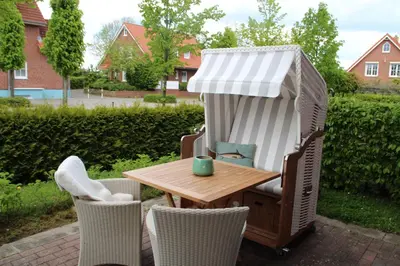 Ein Garten an der Unterkunft Strandbude16