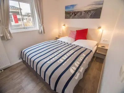 Ein Bett oder Betten in einem Zimmer der Unterkunft Pier98 22