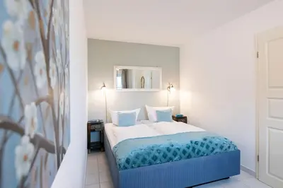 Ein Bett oder Betten in einem Zimmer der Unterkunft Hansa-Residenz Kleine Oase Scharbeutz