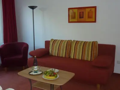 Ein Sitzbereich in der Unterkunft Hotel Grüner Jäger