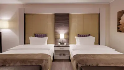 Ein Bett oder Betten in einem Zimmer der Unterkunft Bayside