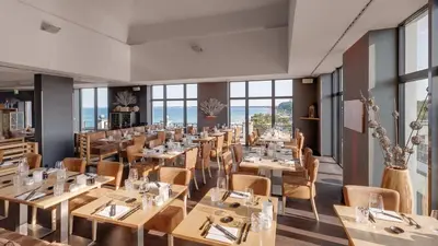 Ein Restaurant oder anderes Speiselokal in der Unterkunft Bayside