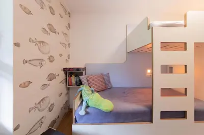 Ein Bett oder Betten in einem Zimmer der Unterkunft Ferienwohnung Gartenkoje - Haffkrug