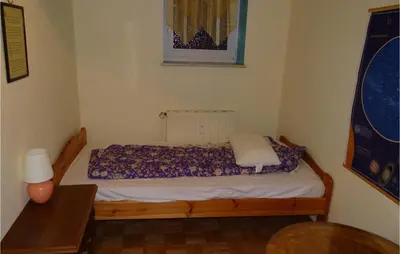 Ein Bett oder Betten in einem Zimmer der Unterkunft 1 Bedroom Lovely Apartment In Schönberg