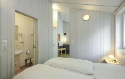 Ein Bett oder Betten in einem Zimmer der Unterkunft Schmugglerstieg 13B - Dorf 5