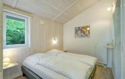 Ein Bett oder Betten in einem Zimmer der Unterkunft Schmugglerstieg 9C - Dorf 5