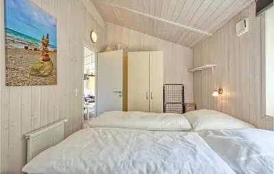 Ein Bett oder Betten in einem Zimmer der Unterkunft Freibeuterweg 20 - Dorf 5