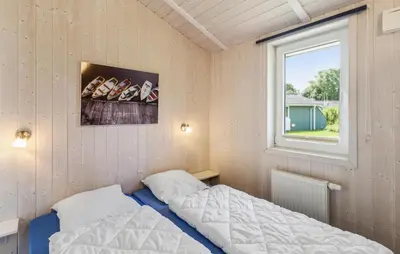 Ein Bett oder Betten in einem Zimmer der Unterkunft Freibeuterweg 21 - Dorf 5