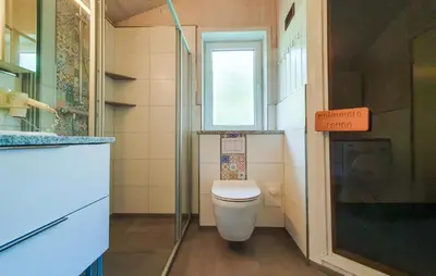 Ein Badezimmer in der Unterkunft Pulverhorn 9 - Dorf 4