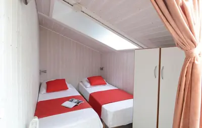 Ein Bett oder Betten in einem Zimmer der Unterkunft Freibeuterweg 8 - Dorf 6