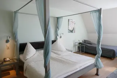 Ein Bett oder Betten in einem Zimmer der Unterkunft Wennhof