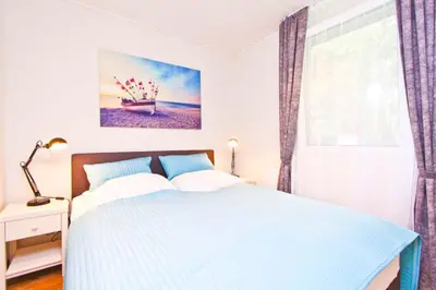 Ein Bett oder Betten in einem Zimmer der Unterkunft Gronenberger Mühle Haus 03