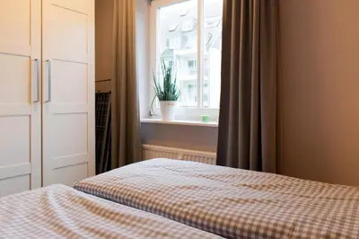 Ein Bett oder Betten in einem Zimmer der Unterkunft Ferienwohnung Beach Life 4 - Scharbeutz