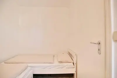 Ein Bett oder Betten in einem Zimmer der Unterkunft Strandresidenz Timmendorfer Strand Strandresidenz Appartement 108