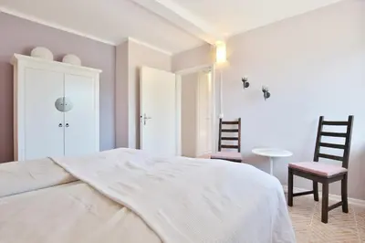 Ein Bett oder Betten in einem Zimmer der Unterkunft Ferienbungalow Erlenweg 20 Erlenweg 20 Appartement 1 Niendorf Ostsee