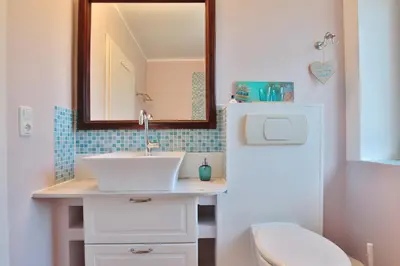 Ein Badezimmer in der Unterkunft Ferienbungalow Erlenweg 20 Erlenweg 20 Appartement 1 Niendorf Ostsee