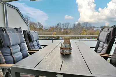 Ein Sitzbereich in der Unterkunft Strandglück Haus C Strandglück Appartement Strand 6