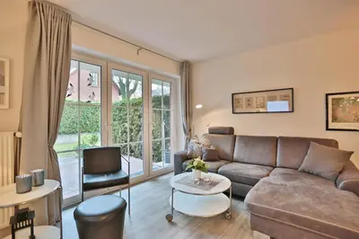 Ein Sitzbereich in der Unterkunft Residenz Alte Bergstraße Residenz Alte Bergstrasse Appartement 4