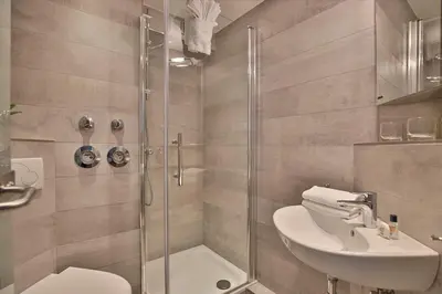 Ein Badezimmer in der Unterkunft Strandhotel - Niendorf Strandhotel Niendorf Appartement 32