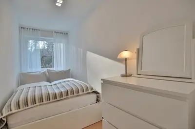Ein Bett oder Betten in einem Zimmer der Unterkunft Domizil Strandallee 30 Domizil Strandallee 30 Appartement 28