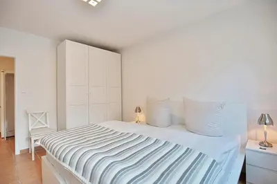 Ein Bett oder Betten in einem Zimmer der Unterkunft Domizil Strandallee 30 Domizil Strandallee 30 Appartement 28
