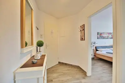 Ein Bett oder Betten in einem Zimmer der Unterkunft Appartements Windrose Appartements Windrose Appartement 14