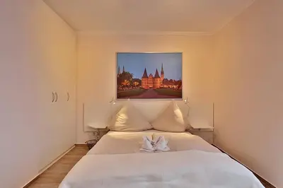 Ein Bett oder Betten in einem Zimmer der Unterkunft Am Rosenhain 9 Am Rosenhain 9 Appartement 3