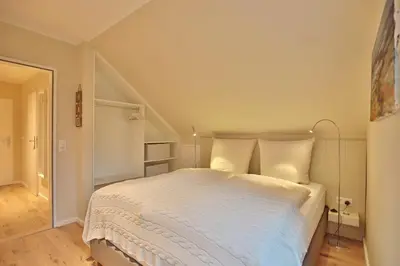 Ein Bett oder Betten in einem Zimmer der Unterkunft Appartementhaus Strandallee 206 Appartementhaus Strandallee 206 Appartement 1