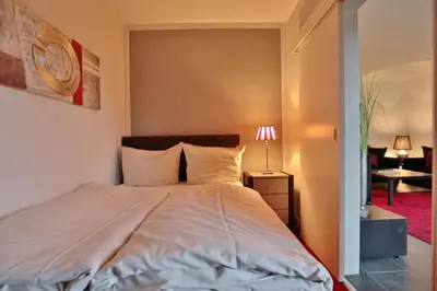 Ein Bett oder Betten in einem Zimmer der Unterkunft Domizil Strandallee 180 Domizil Strandallee 180 Appartement 5