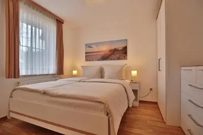 Ein Bett oder Betten in einem Zimmer der Unterkunft Gorch-Fock-Park Haus 06 Gorch-Fock-Park 6 Appartement 4