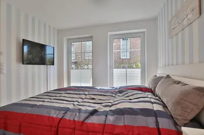Ein Bett oder Betten in einem Zimmer der Unterkunft Residenz Wolburgstraße 49 Residenz Seemuschel Wolburgstr 49 Appartement 02