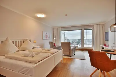 Ein Sitzbereich in der Unterkunft Haus Seebrücke Haus Seebrücke Appartement 02