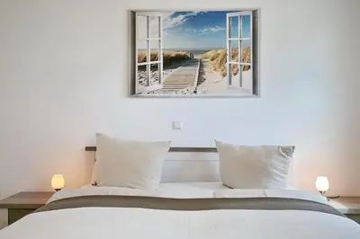 Ein Bett oder Betten in einem Zimmer der Unterkunft Villa Frankfurt Villa Frankfurt Appartement 01